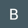 White letter B on a dark blue-gray square.