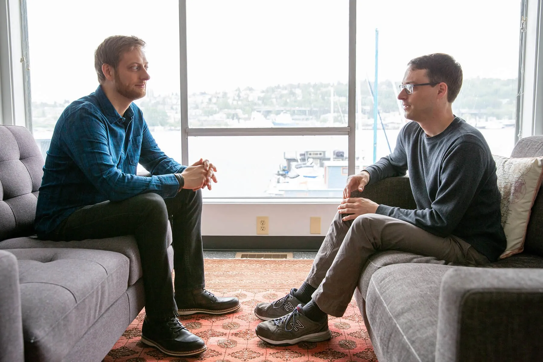 two people talking in a therapy session